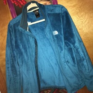 Blue fuzzy north face jacket